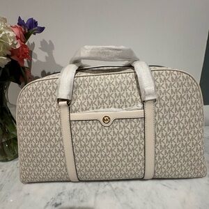 Michael Kors Cream Monogram overnight bag